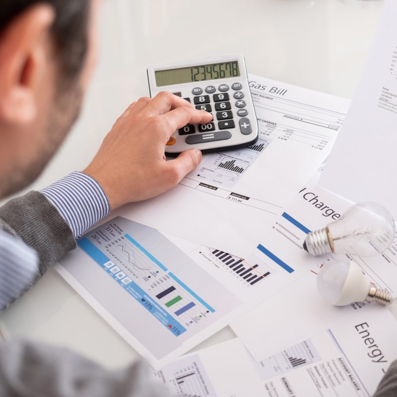 Man looking at utility bills